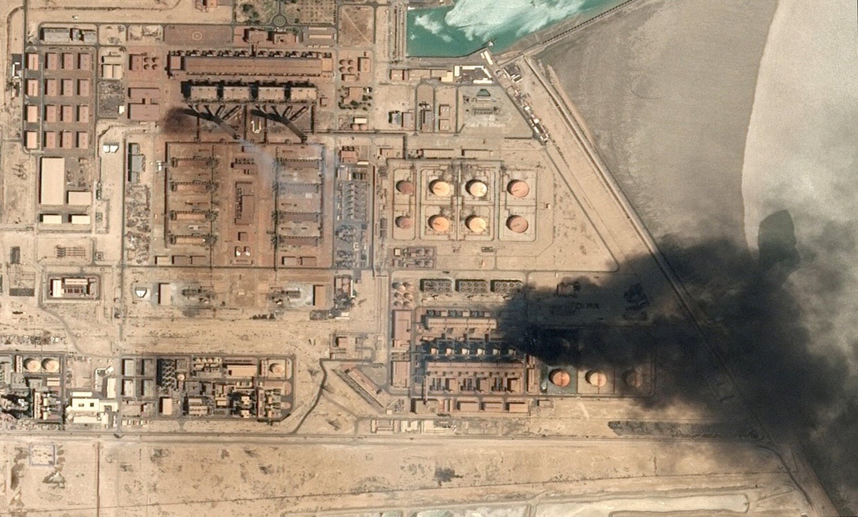 A satellite image shows smoke rising from the Subiya Power and Water Desalination Plant