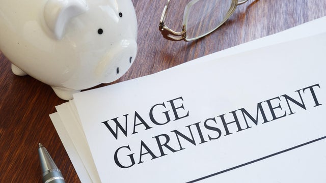 Wage Garnishment Concept Showing Court Ordered Payroll Deductions, Debt Collection Process, Employee Income Withholding, Financial Obligations, Legal Enforcement and Personal Finance Challenges 