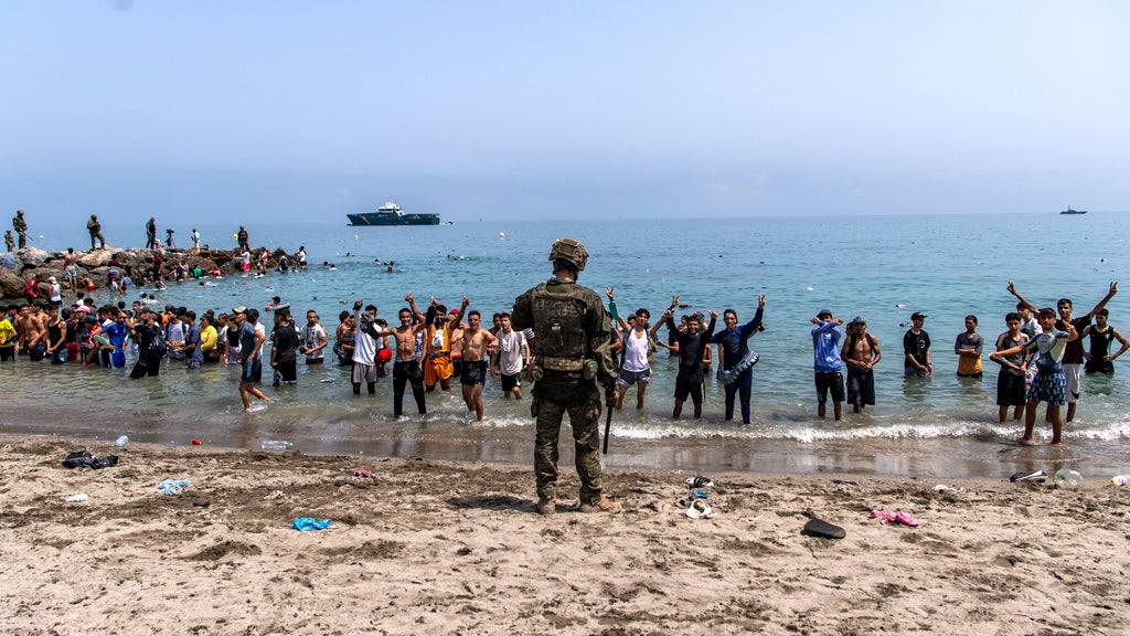Spain Erects Containment Fence Around Ceuta Following Deadly Migrant Influx