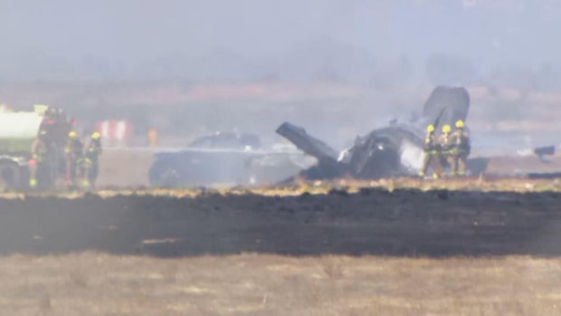 Crews work the scene after an incident at Marine Corps Air Station Miramar in San Diego, July 31, 2026.