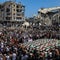 People attend a mass funeral In the Gaza Strip 