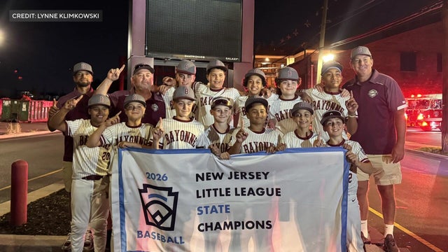 Bayonne vs. Everybody sign and Darien Little League signs 