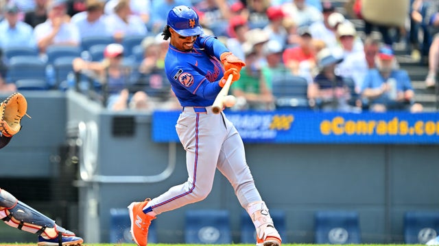 Francisco Lindor #12 of the New York Mets hits a single during the fourth inning against the Cleveland Guardians at Progressive Field on August 06, 2026 in Cleveland, Ohio. 