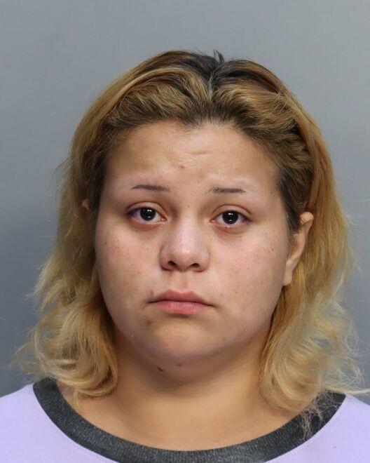 mugshot-woman-strikes-kid.jpg
