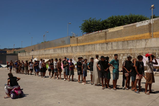 Mass crossings of migrants on foot and by sea from Morocco into Spanish territory, in Ceuta