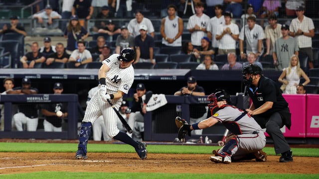 Ben Rice #22 of the New York Yankees hits an RBI single during the game against the Atlanta Braves at Yankee Stadium on August 7, 2026 in New York, New York. 