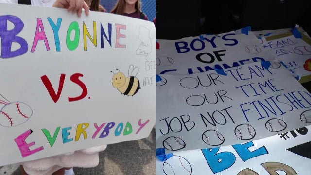 Bayonne vs. Everybody sign and Darien Little League signs 