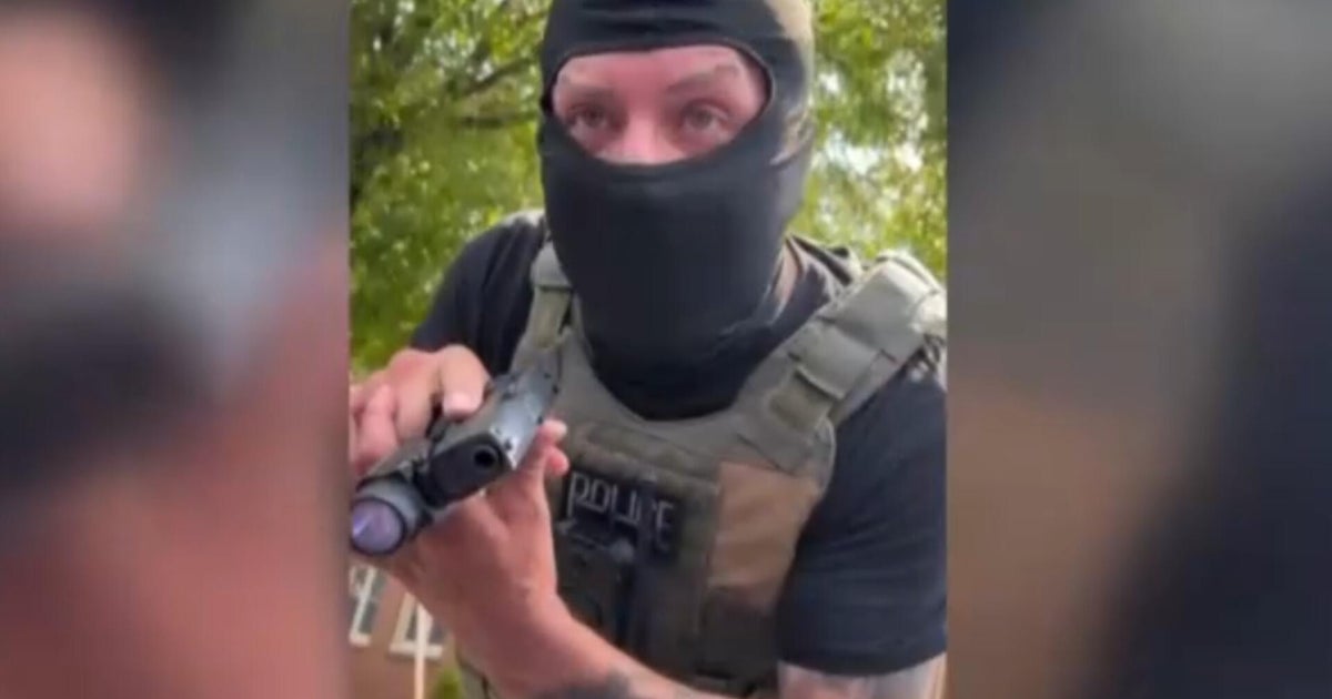 Watch: ICE agent points gun at woman in Virginia, claims she almost ran him over with car