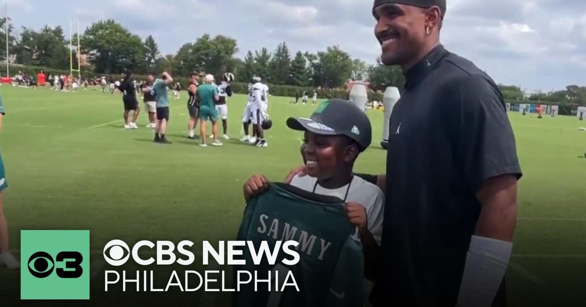 Young boy with sickle cell disease meets Jalen Hurts and Saquon Barkley