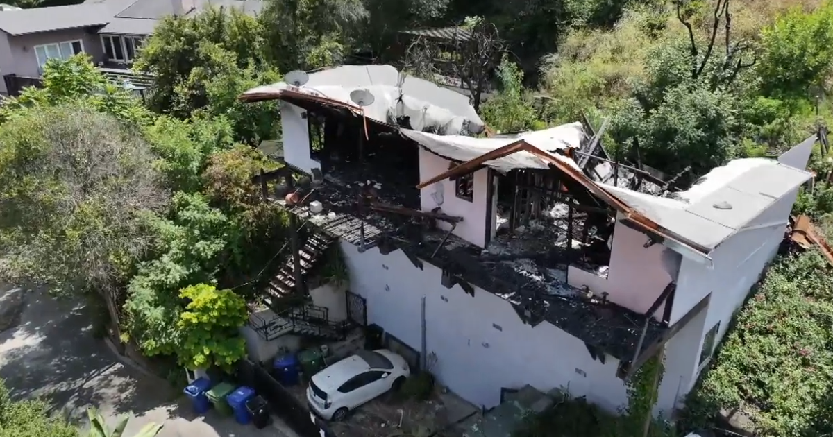More than a year after a Los Angeles fire destroyed homes, residents are still waiting for debris removal