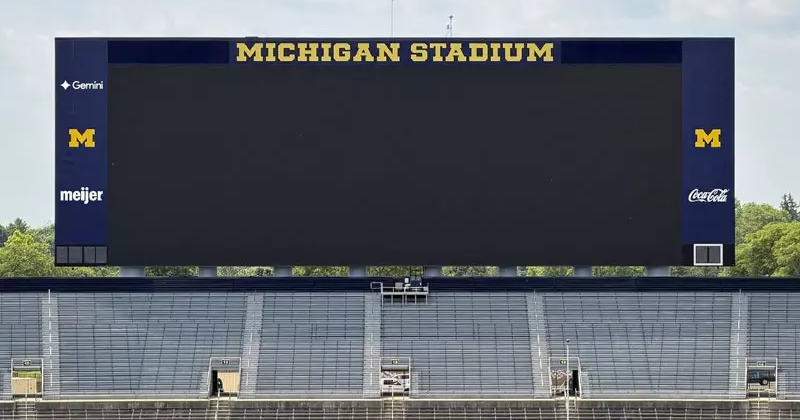 Michigan Stadium will display advertisements for the first time in 99 years