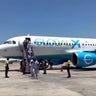Plane carrying Haitian deportees from U.S. 
