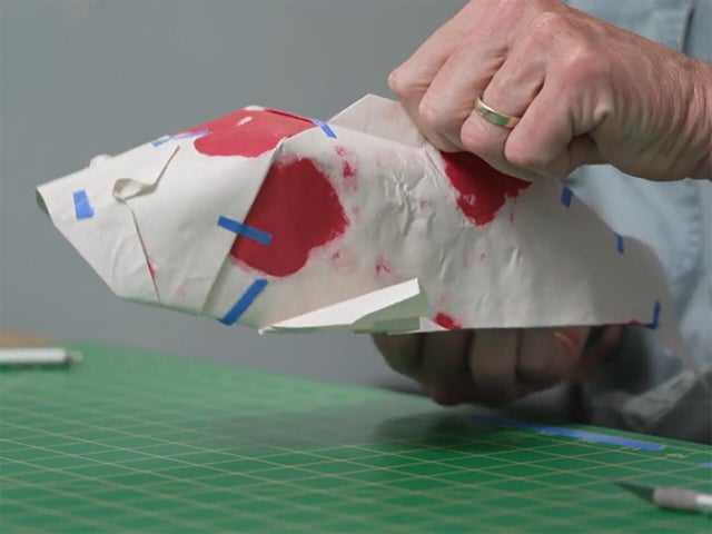 From the ashes arise origami koi - CBS News