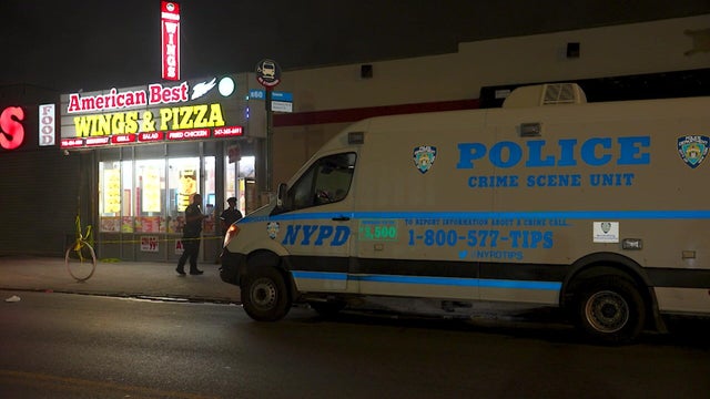NYPD vehicle outside restaurant 