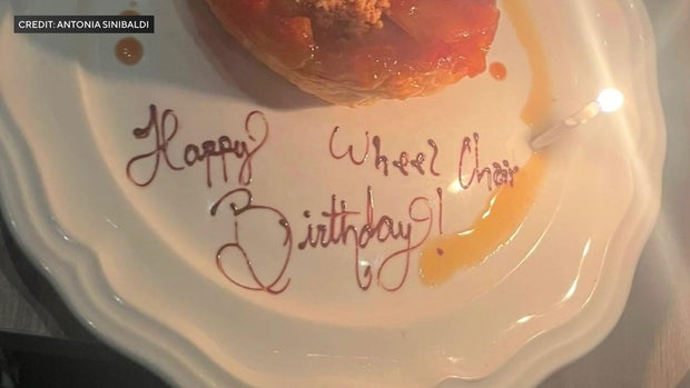 "Happy Wheel Chair Birthday!" written on a dessert plate 