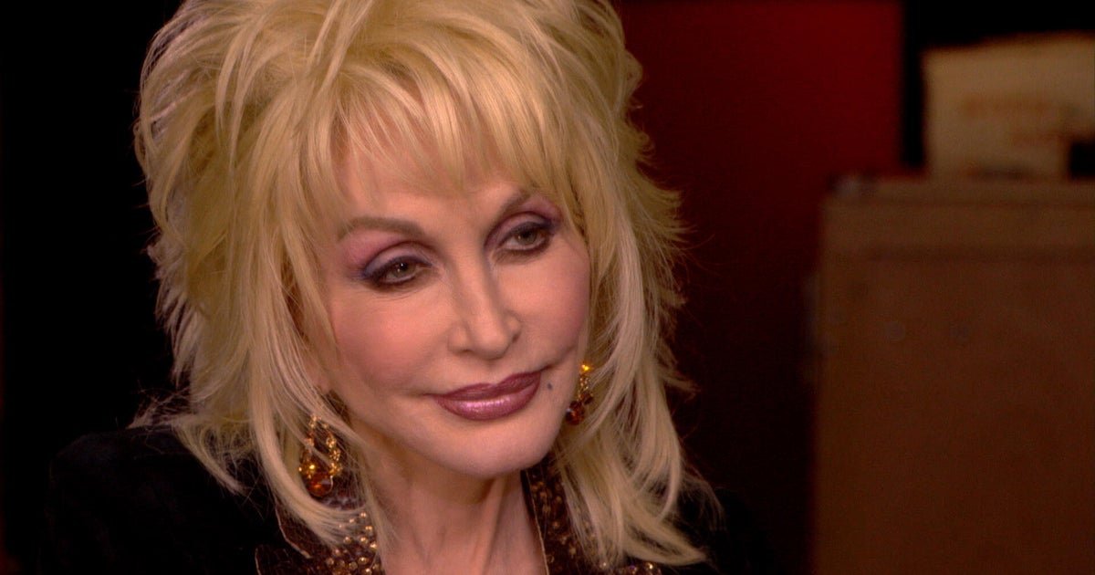 Dolly Parton said “the town tramp” inspired her iconic look | 60 Minutes Archive
