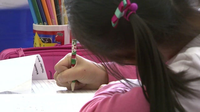 Young student writing 