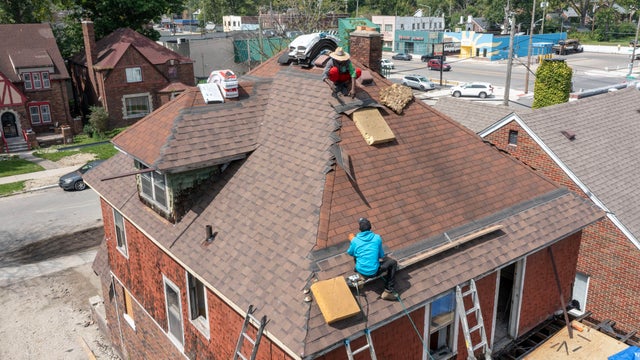Workers Remodel Vacant Home in Detroit 