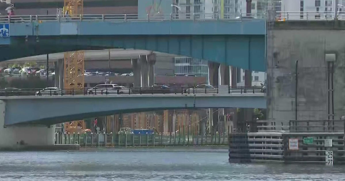 Investigation launched after man's body found floating down Miami River, police say