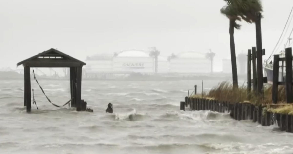 Edouard dumps rain on the Gulf Coast forcing power outages and flooding