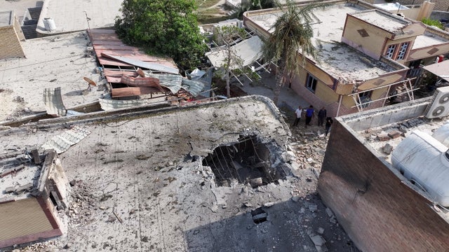 An aerial view shows damage to buildings in the aftermath of an alleged U.S. strike on a wedding party, in Kuhestak, Iran, Sept. 2, 2026. 