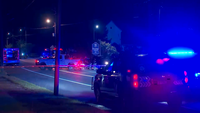 Generic police lights and yellow police tape at crime scene 