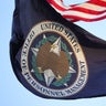 An organizational flag flies outside of the Office of Personnel Management in Washington, D.C., on Feb. 7, 2025. 