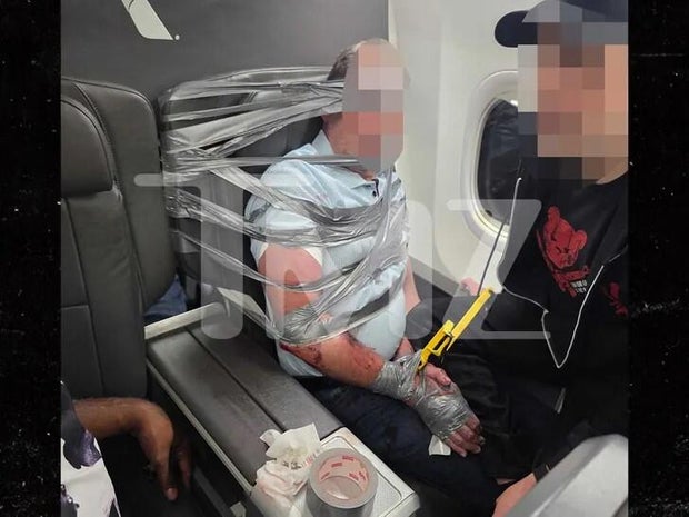 tmz-american-airlines-passenger-restrained.jpg