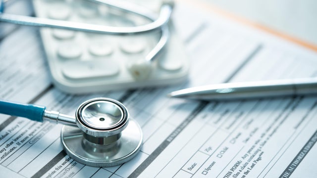 Open enrollment healthcare benefit forms. 