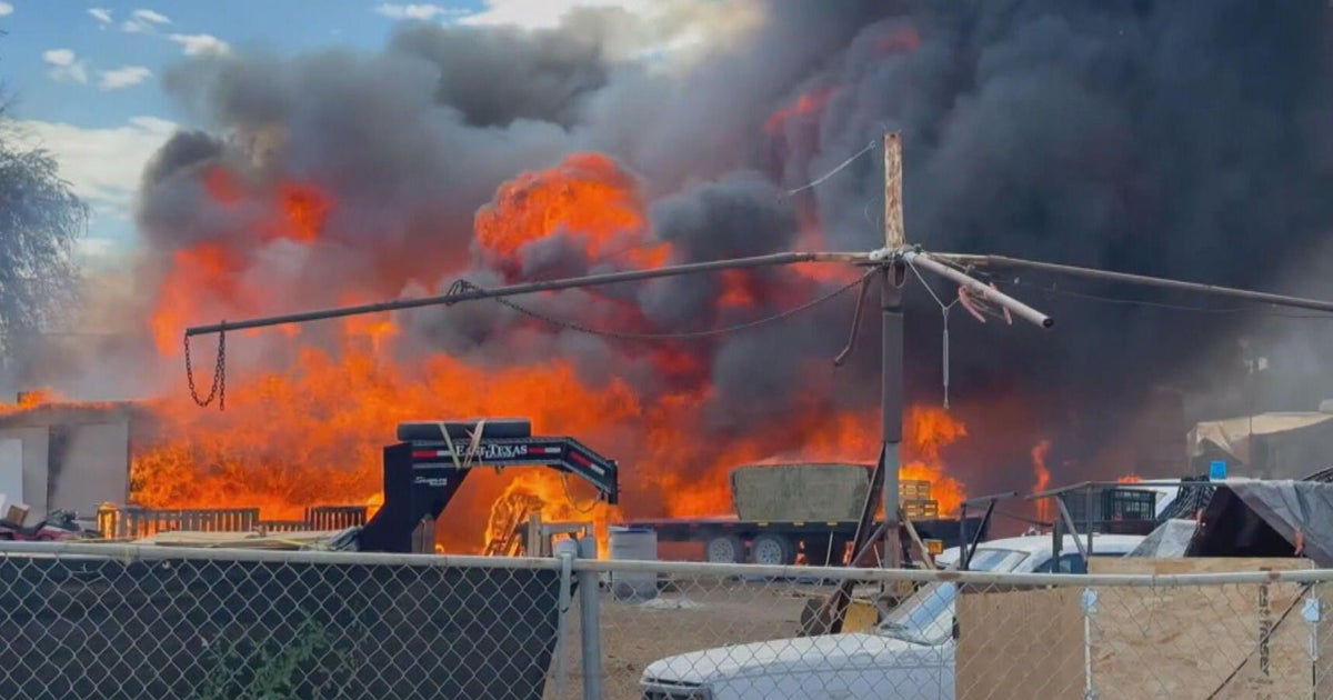 cbsnews.com - Jennifer  McRae - 1 dead in house fire northeast of Denver, flames spread to motor homes
