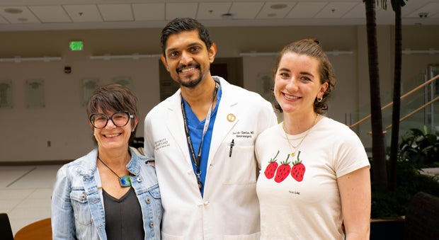 image-kim-and-caroline-with-dr-cherian-at-reunion.jpg