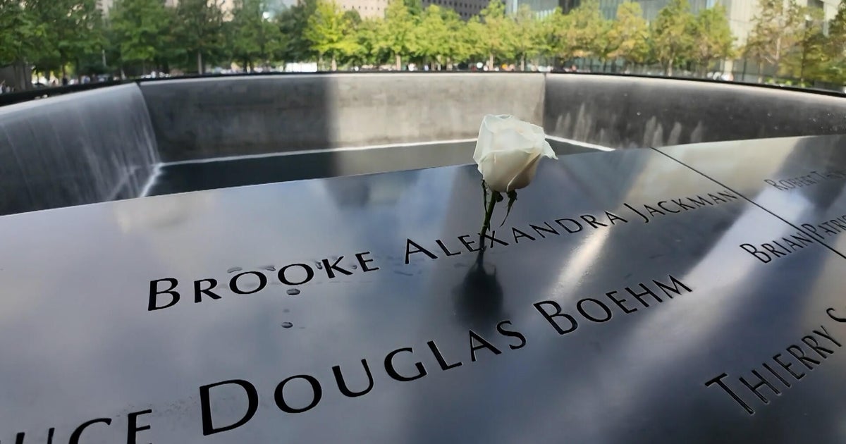 Why flowers are placed on some names at the 9/11 Memorial