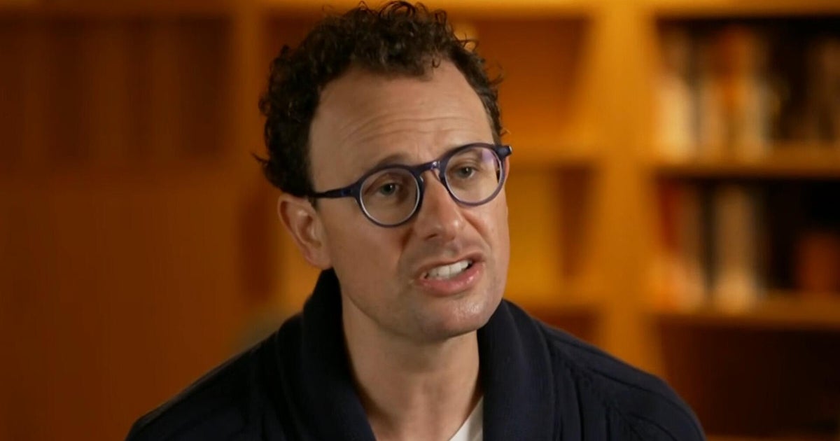 Anthropic CEO says pace of AI development needs to slow down, but "it doesn't mean we need to panic"