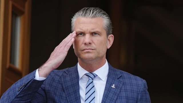 Defense Secretary Pete Hegseth salutes as he welcomes Germany's defense minister at the Pentagon in Arlington, Virginia, Sept. 15, 2026. 
