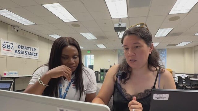 A fire survivor applies for federal disaster assistance 