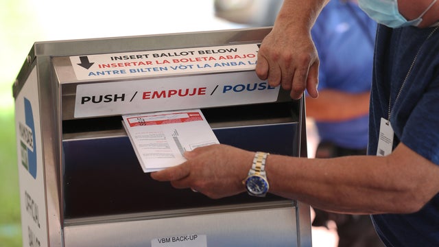 Florida Voters Drop Off Absentee Ballots In Special Boxes Ahead Of Election 