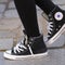 Converse apologizes for sneaker ad after critics say it uses racist imagery