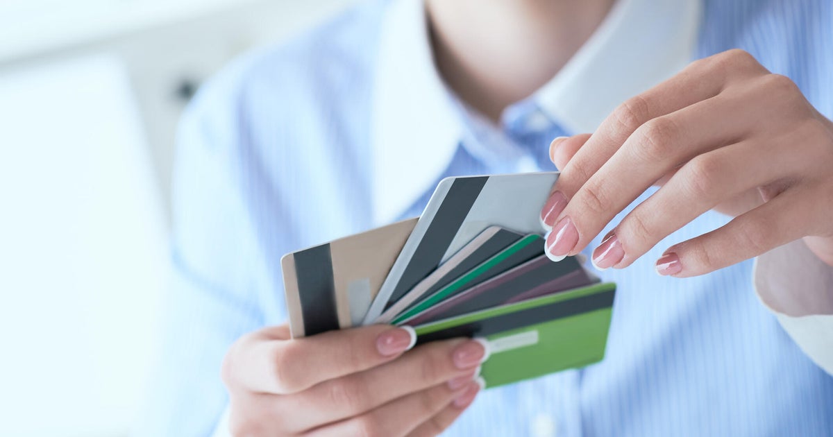 Many Americans are relying on multiple forms of credit to cover expenses. When is it a warning sign?