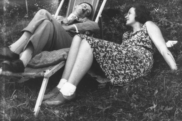 Adolf Hitler (left), German Nazi politician, in a deck chair next to is niece Angela (Geli) Raubal - around 1930
