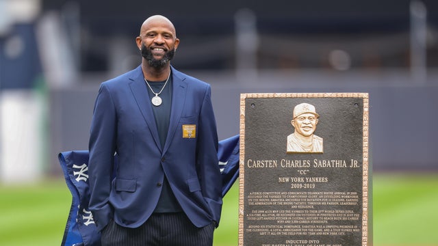 CC Sabathia poses for a photo with his plaque during his number retirement ceremony on the field prior to the game between the Baltimore Orioles and the New York Yankees at Yankee Stadium on Friday, September 25, 2026 in New York, New York. 