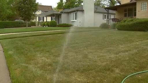 Tighter watering restrictions go into effect in two of Colorado's biggest cities