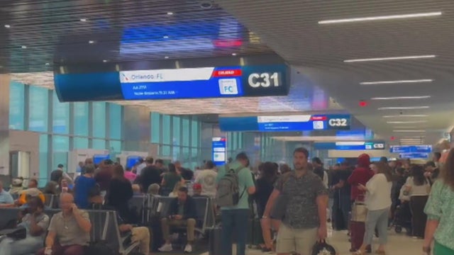 Flight delays and cancelations at DFW after rainy day