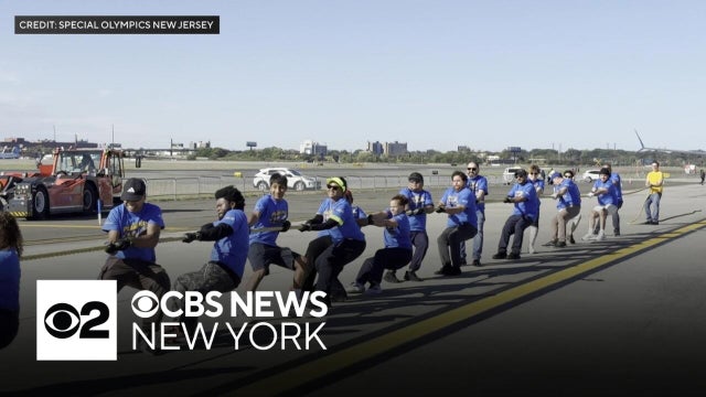Teams pull airplane for Special Olympics event at Newark Airport