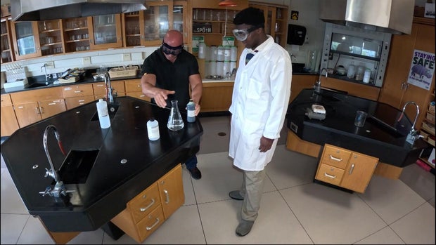 Baldwin High School chemistry teacher Anthony Simonelli and student Jojo Yawson