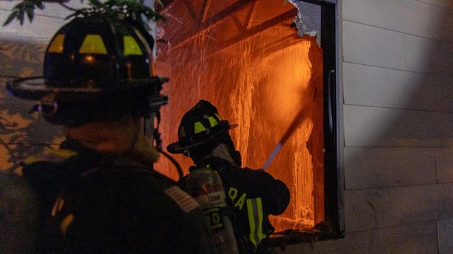 Aurora firefighter falls through the floor while battling house fire