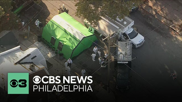 Forensic investigators removing items from Horsch "house of horrors" linked to missing women