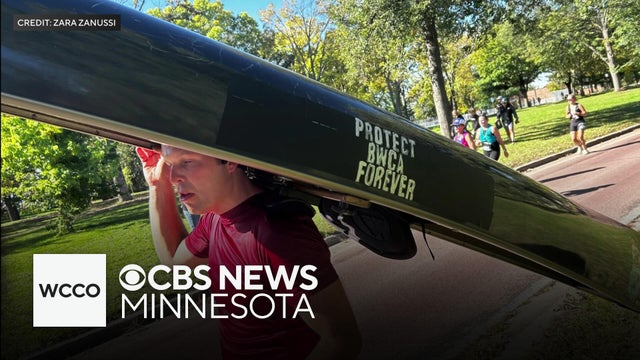 Twin Cities marathon runner took on 26.2 miles while carrying canoe