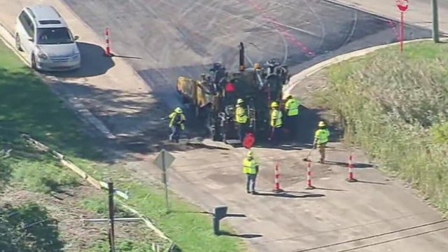 Crews removing pavement at U.S. 24 sinkhole