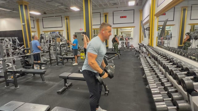 Braun lifts weights at a gym seven months after open-heart surgery 