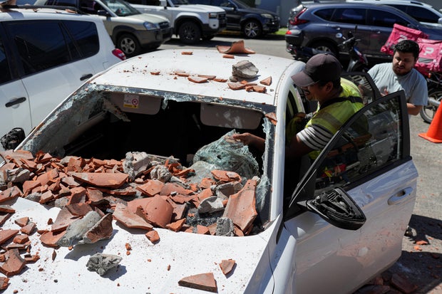 A car was damaged by falling debris after an earthquake in Panama City, Panama, Oct. 9, 2026.